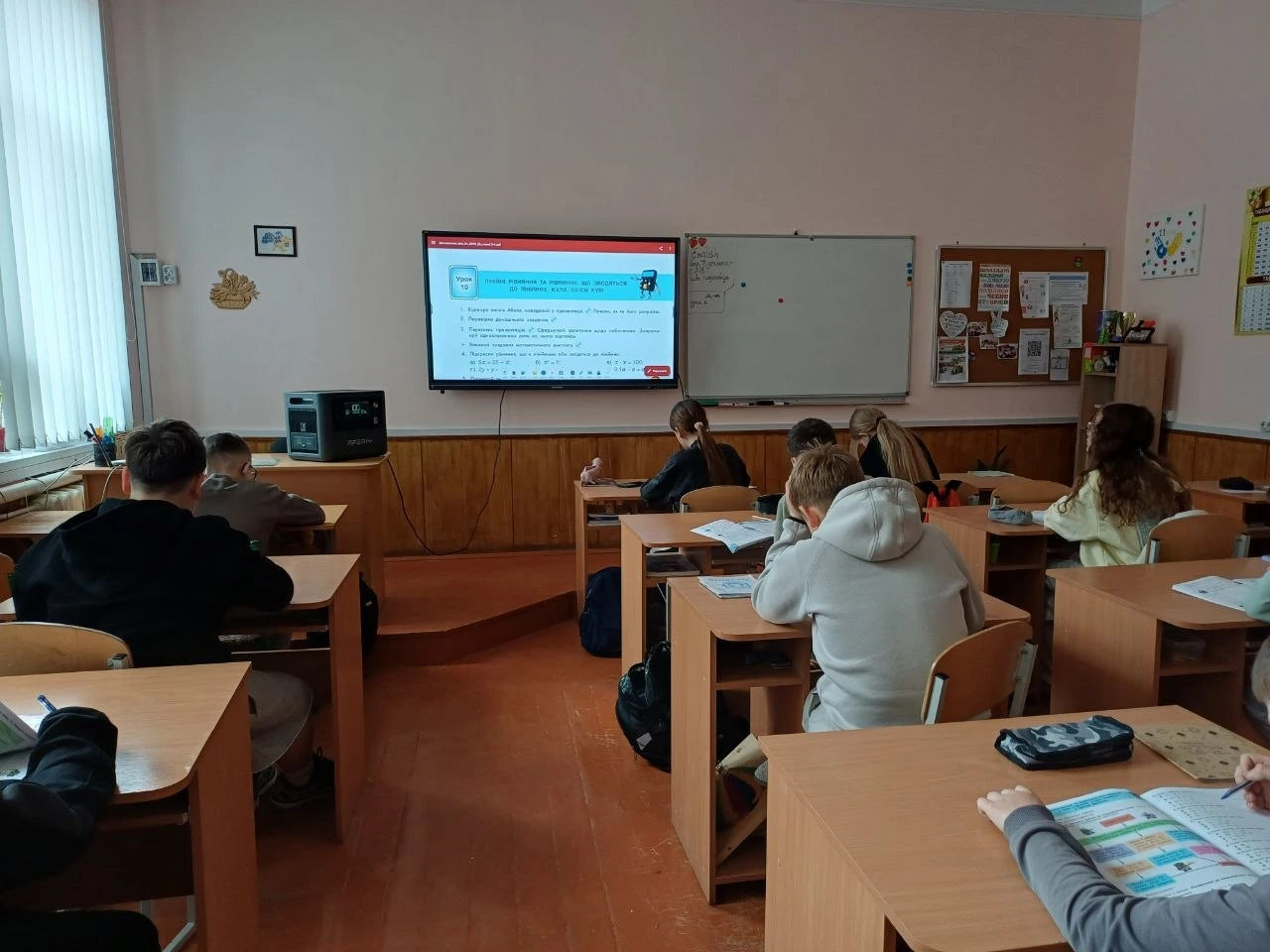 AFERIY portable power station powering a classroom projector